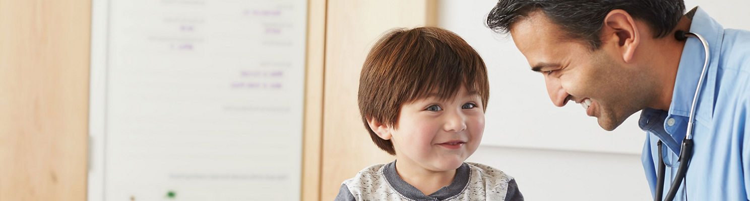 Boy patient with male doctor