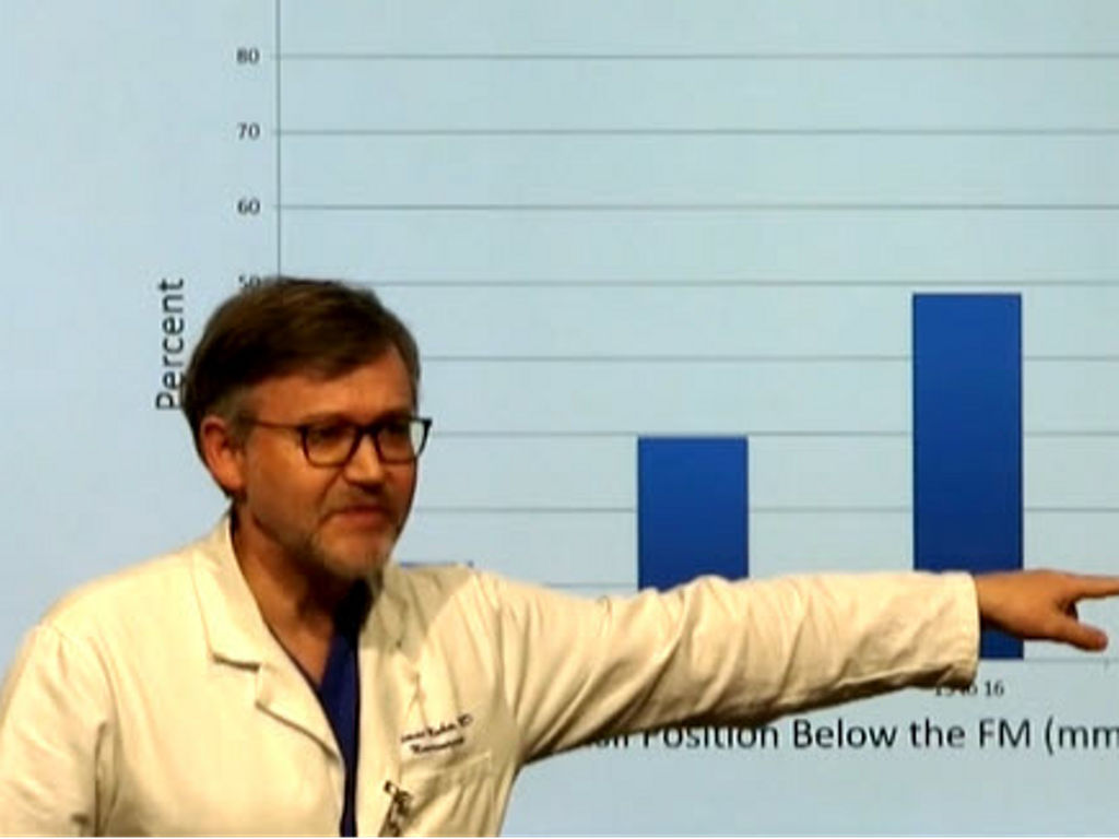 Cormac Maher, MD giving lecture