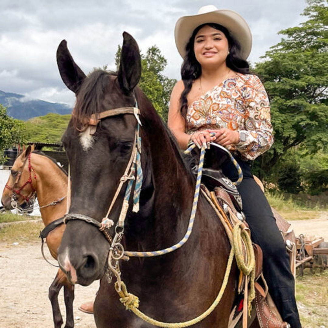 Diana Topete sitting on a horse