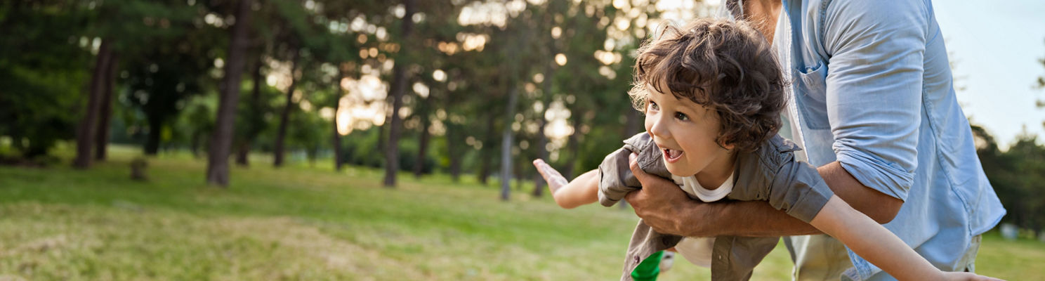 Father and son playing