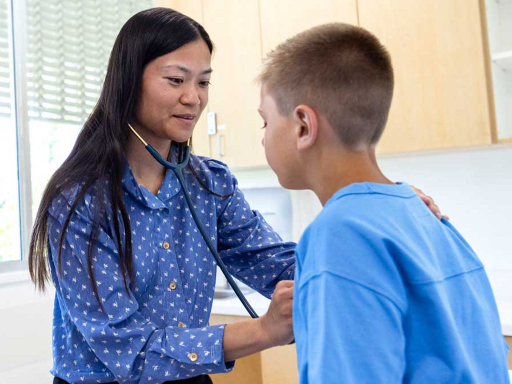 Dr. Sophia Giang with a patient