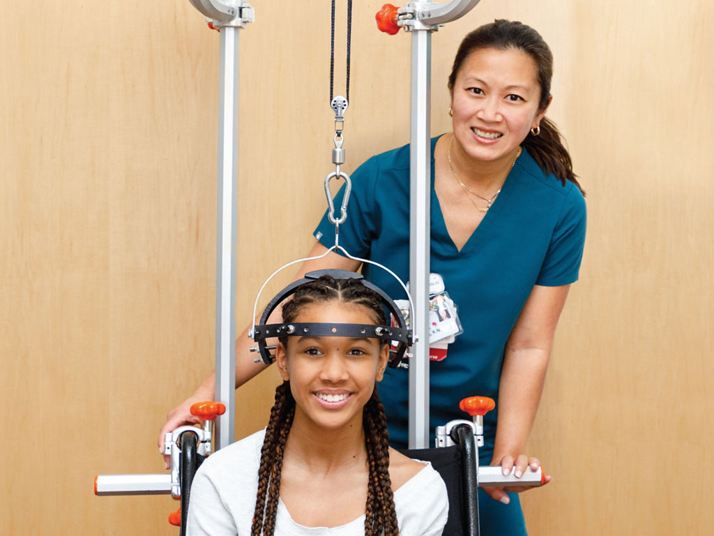 Nurse with patient in wheelchair