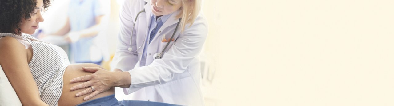 Doctor examining pregnant patient