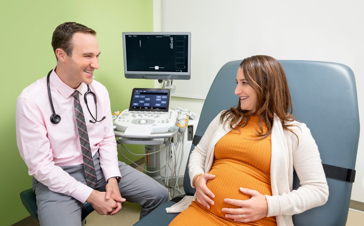 pregnant woman with physician
