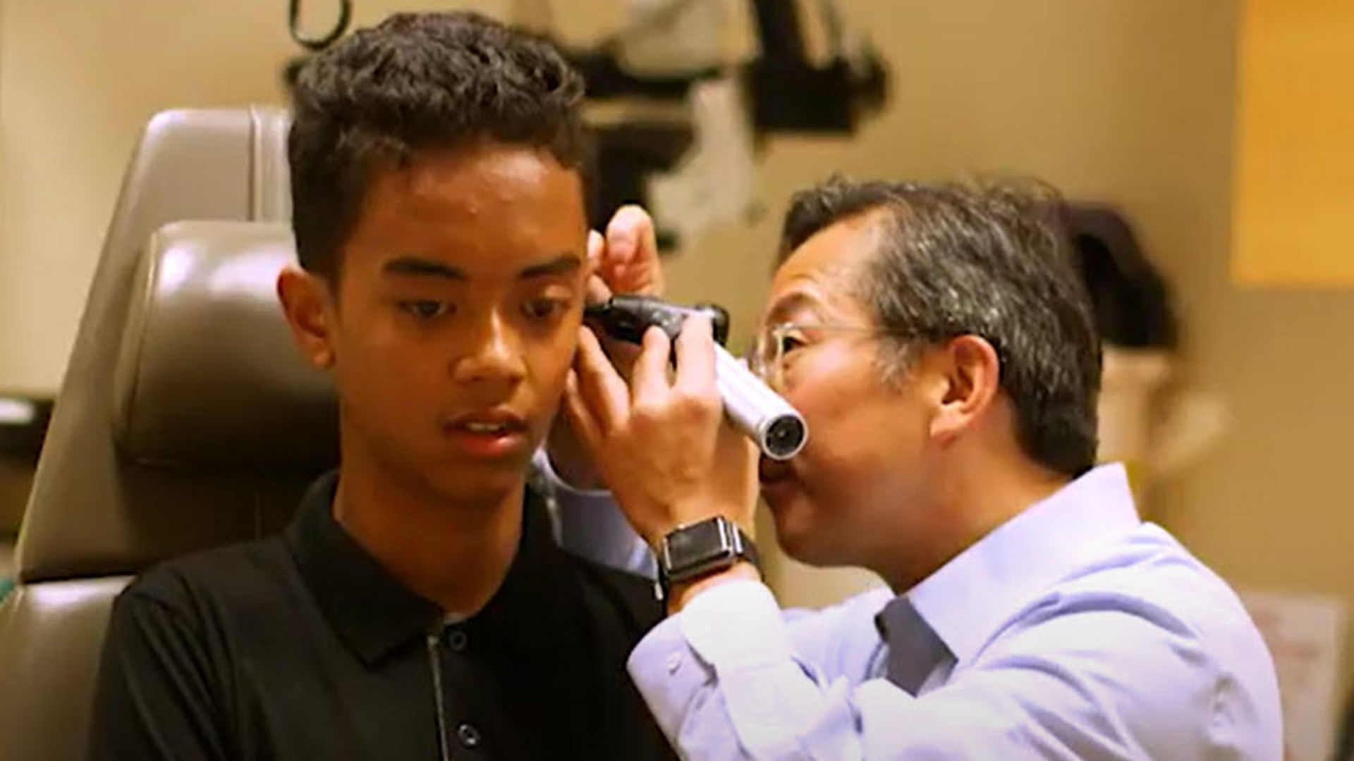 Dr. Cheng with patient at the Hearing Center