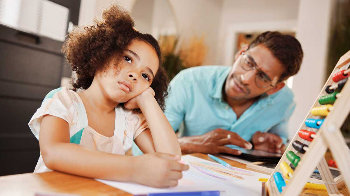 Young girl with her parent