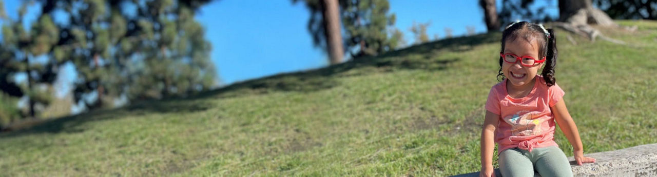 Yair sitting in a park