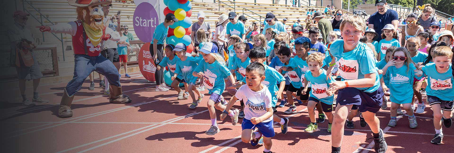 Children running at the Summer Scamper