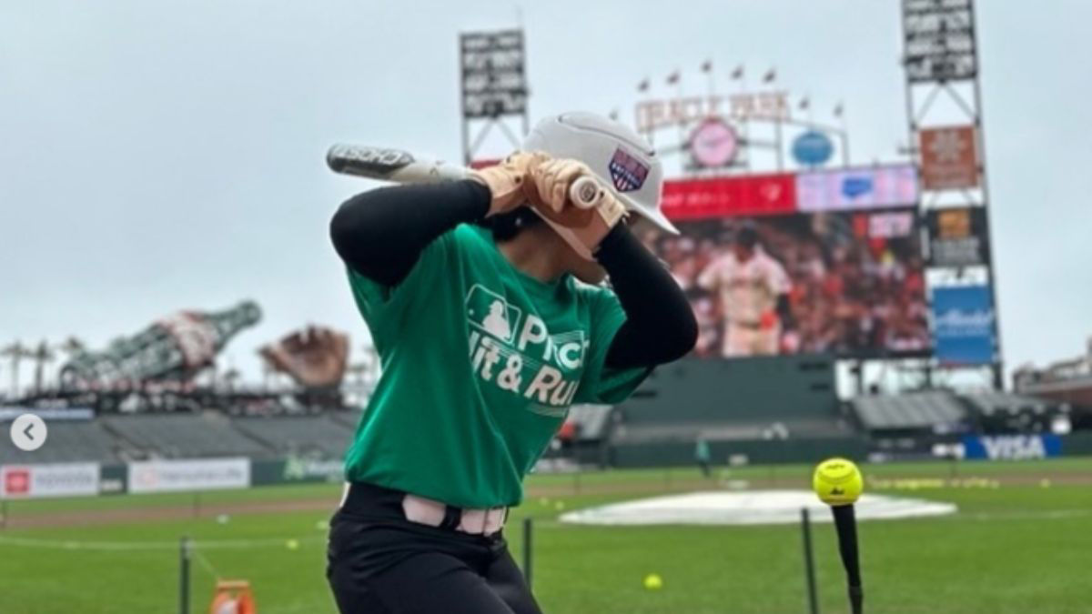 Teen getting ready to swing and hit a baseball